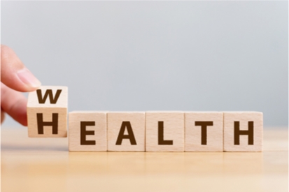 child blocks spelling wealth and health