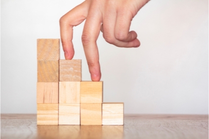 child blocks stacked like steps